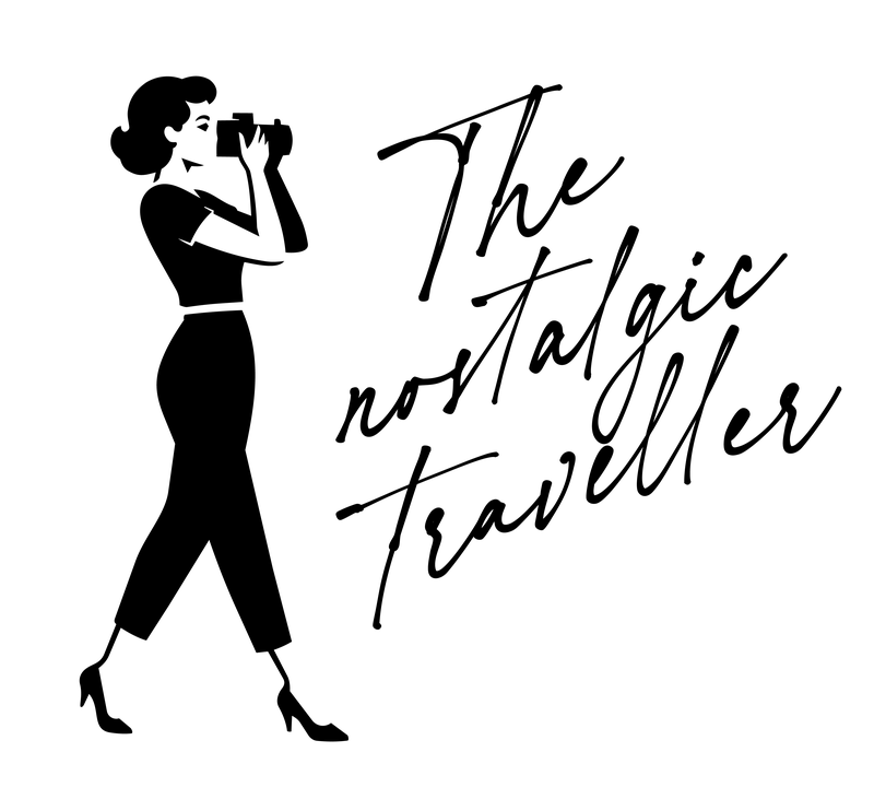 The Nostalgic Traveller · Logo